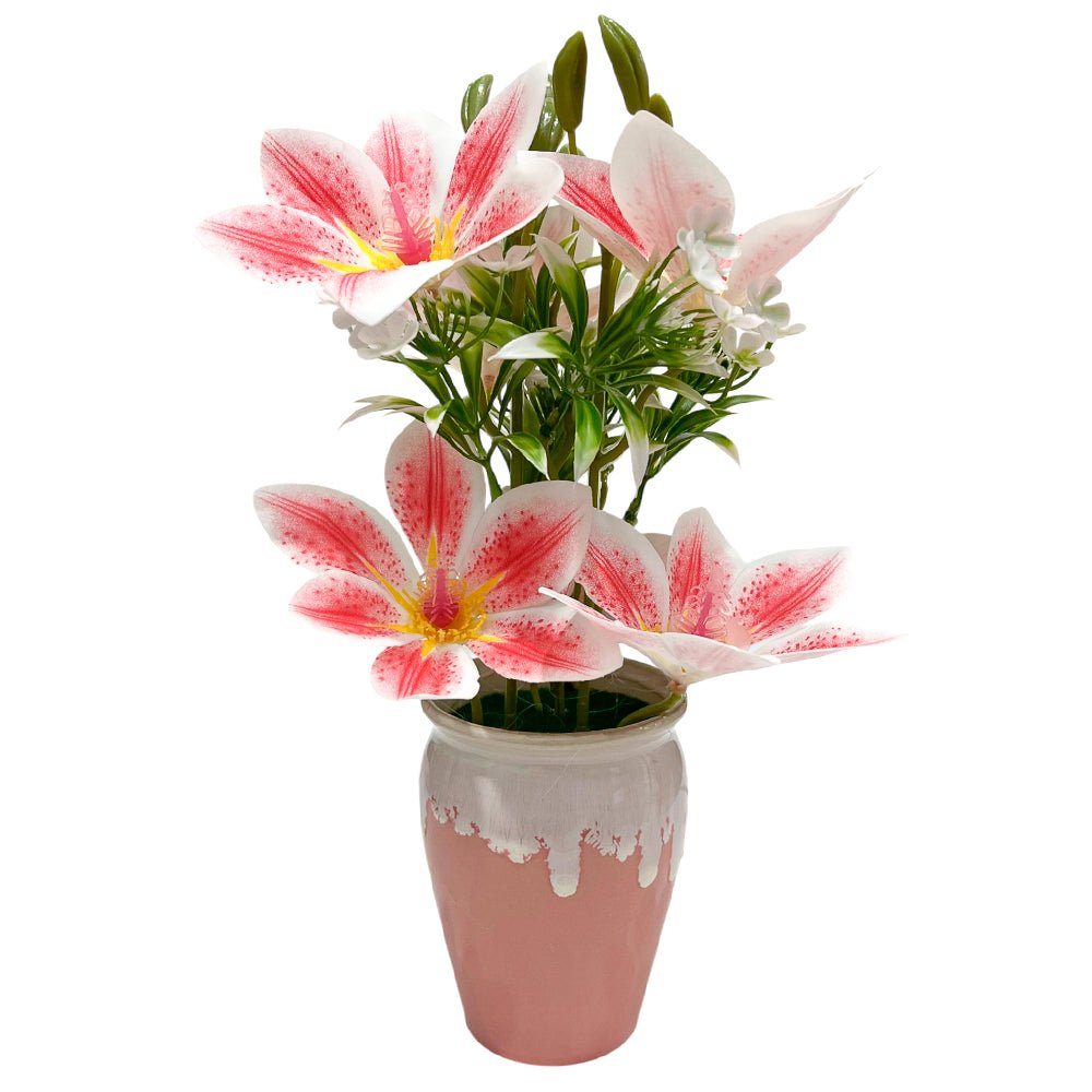 Planta decorativa con flores surtidas Home Elegance en pote.