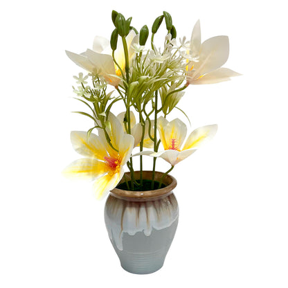 Planta decorativa con flores surtidas Home Elegance en pote.